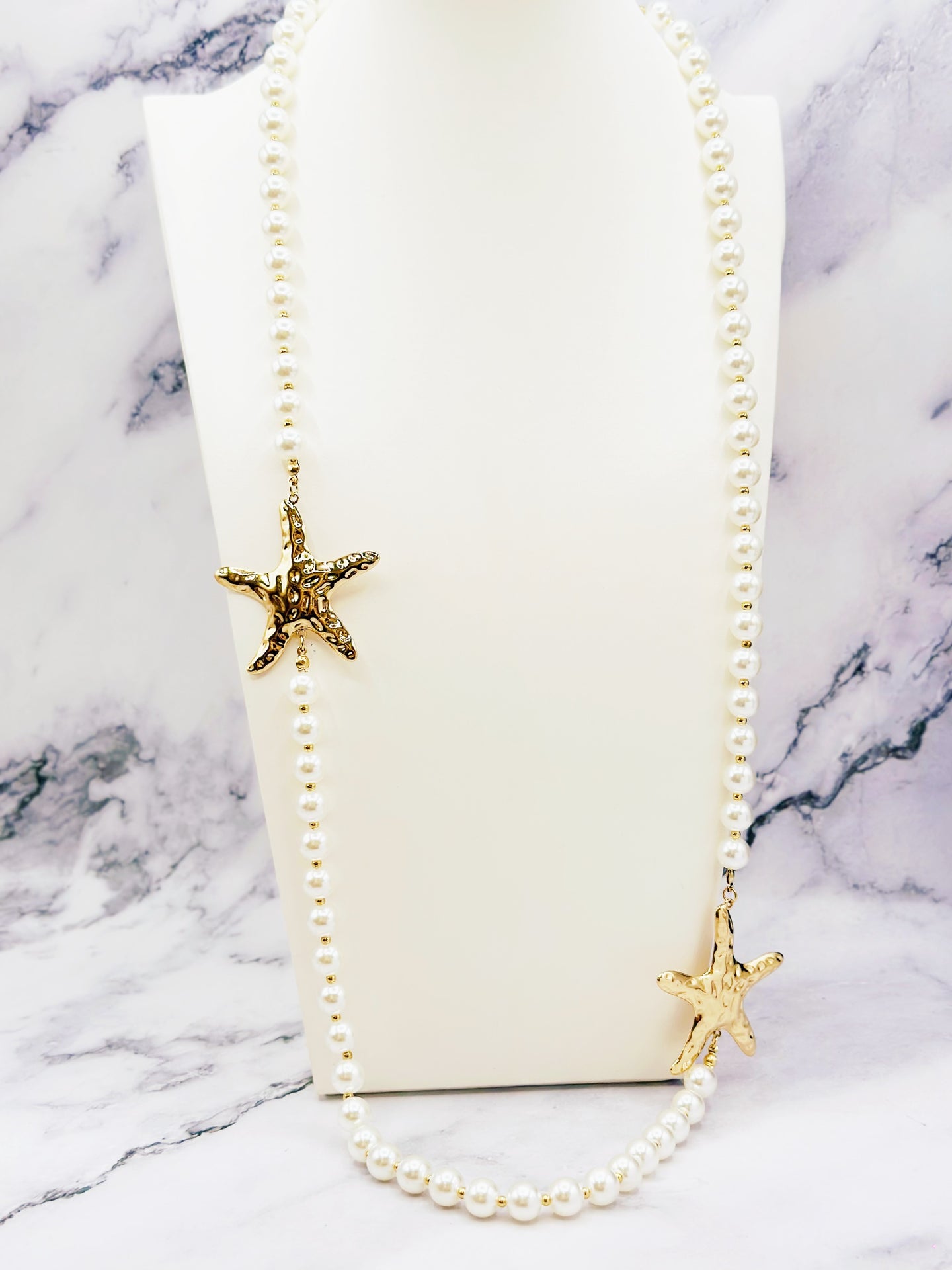 Sautoir perles et étoiles de mer