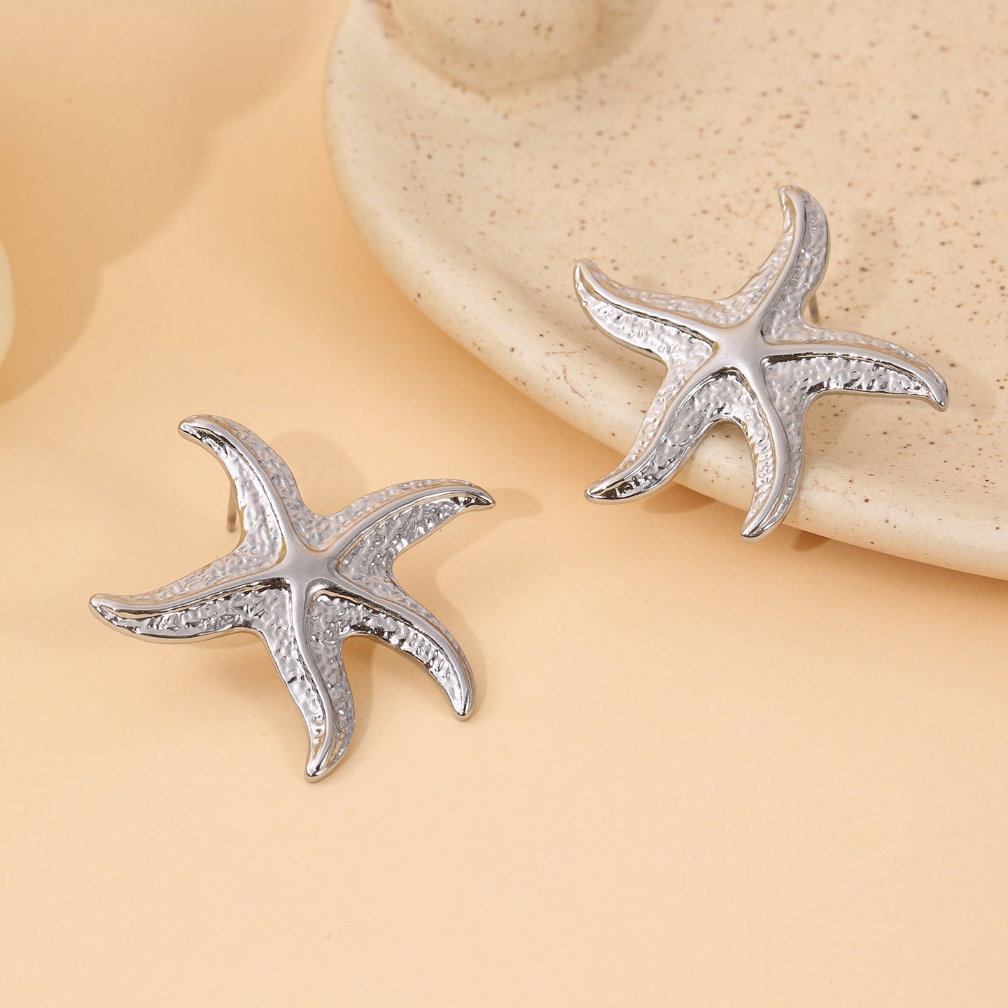 Boucles d'Oreilles Clous Argentées Forme Étoile De Mer Texturée