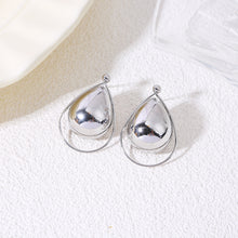 Charger l'image dans la galerie, Boucles d’oreilles argentées pendantes gouttes bombées cerclées d’un anneau fin
