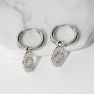 Boucles d'Oreilles Argentées Avec Pendentifs Petits Disques Motif Yeux☀️